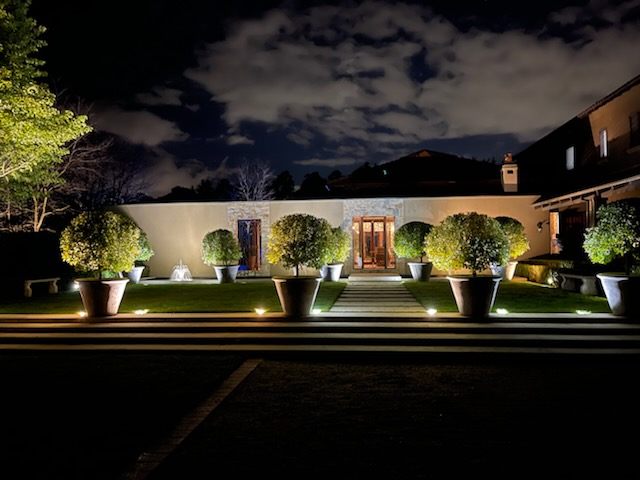 Outdoor garden lighting setup for residential property - Hedges